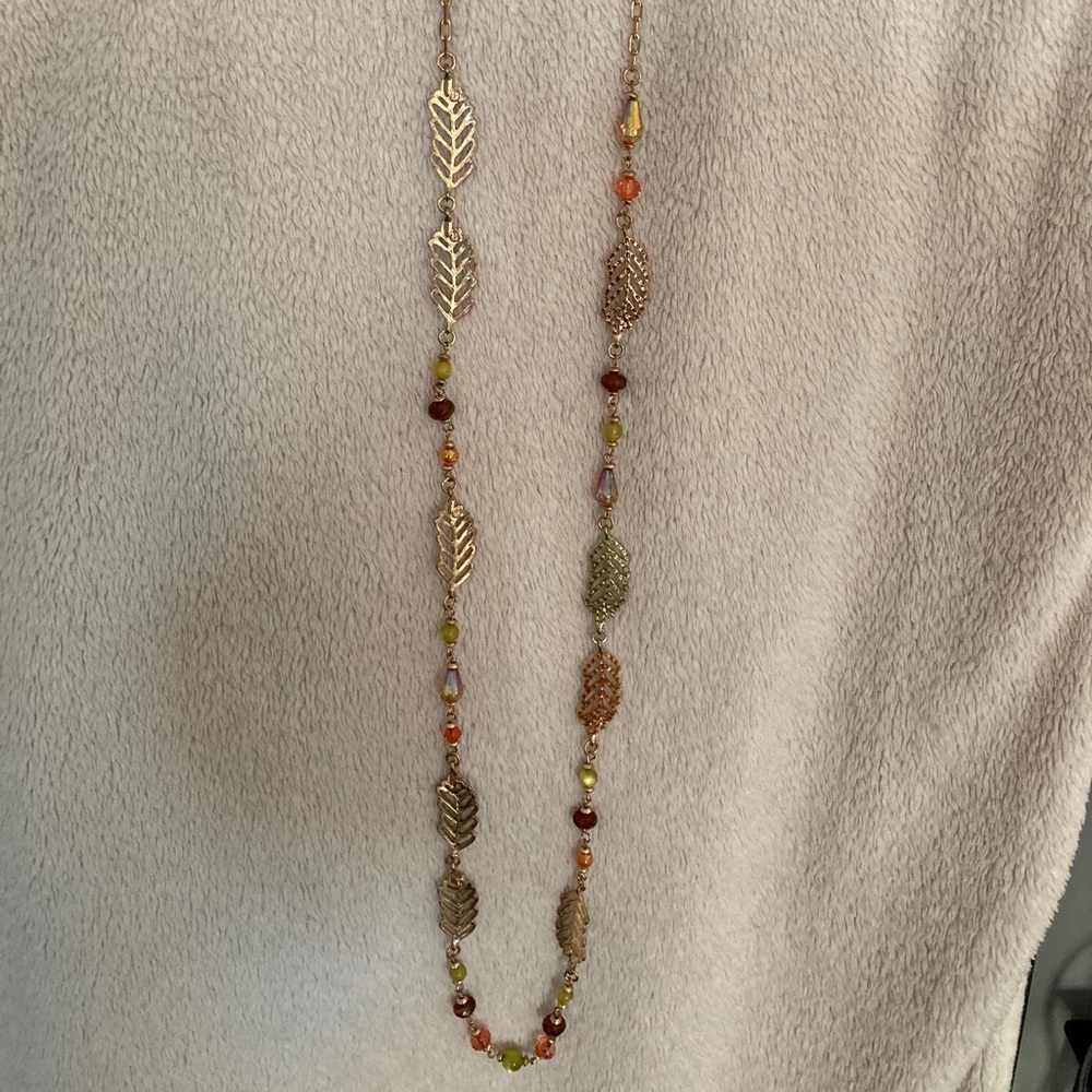 Gold necklace with multi colored gems